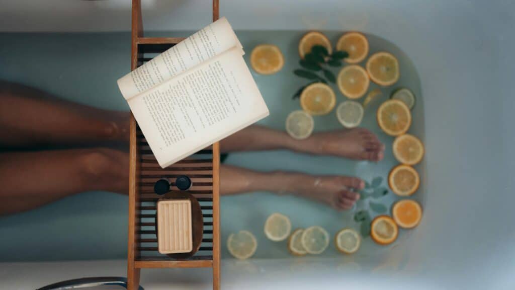 woman taking care of herself in bathtub