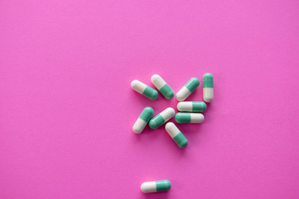 inderal pills on pink background