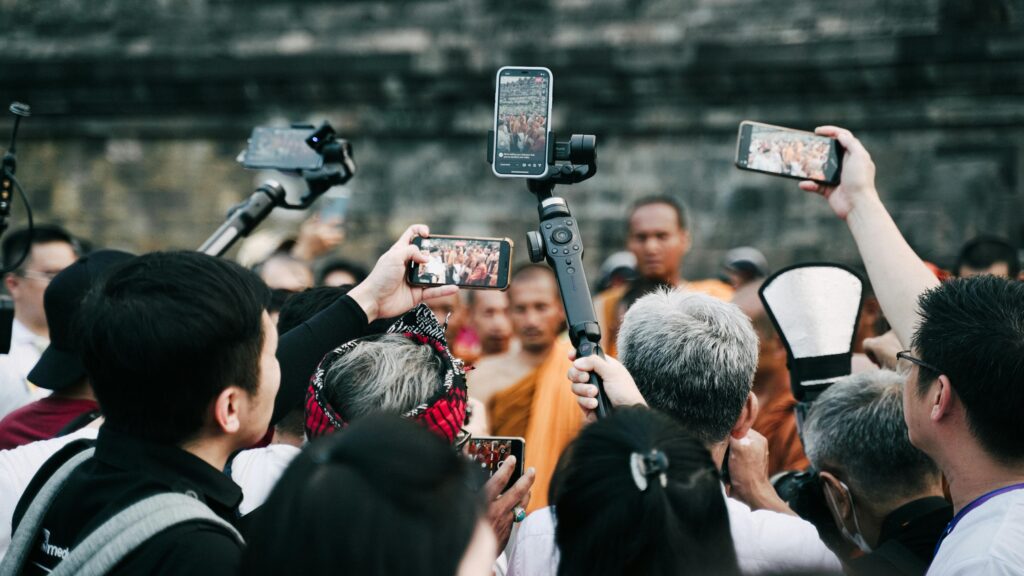 people outside taking a picture