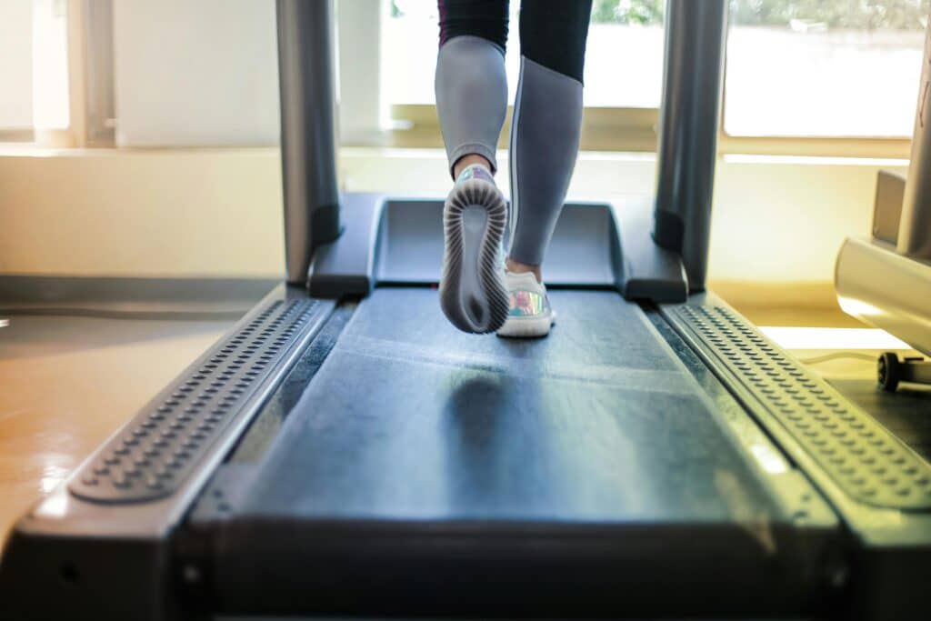 person running on treadmill