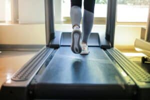 person running on treadmill