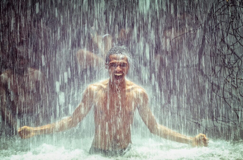 man in water being tough