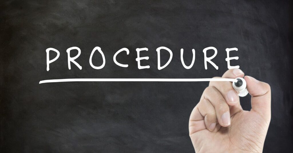 A hand holding a chalk and drawing a white underline under the word PROCEDURE on a dark chalkboard, symbolizing a procedure or process.