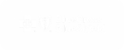 Group-1437254321-1png - Treat Mental Health Tennessee BlueCross BlueShield logo watermark on a pale background (cross and shield icon)
